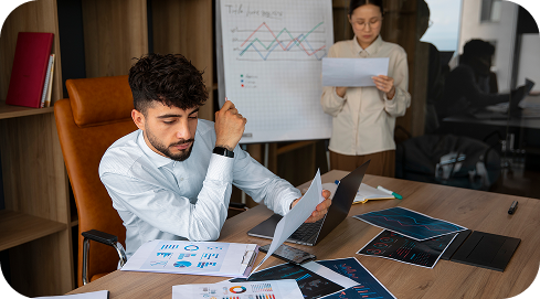 office-workers-using-finance-graphs 1