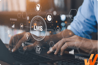 Hands typing on a laptop with a digital overlay displaying "LMS" and icons like charts and graphs, suggesting focus and technology integration.